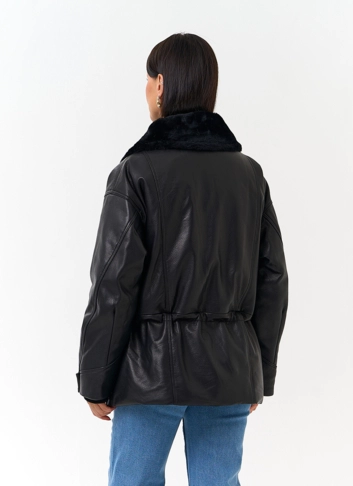 Женский пуховик из натуральной кожи фото