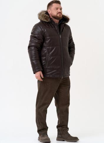 Пуховик из эко кожи с капюшоном из меха енота